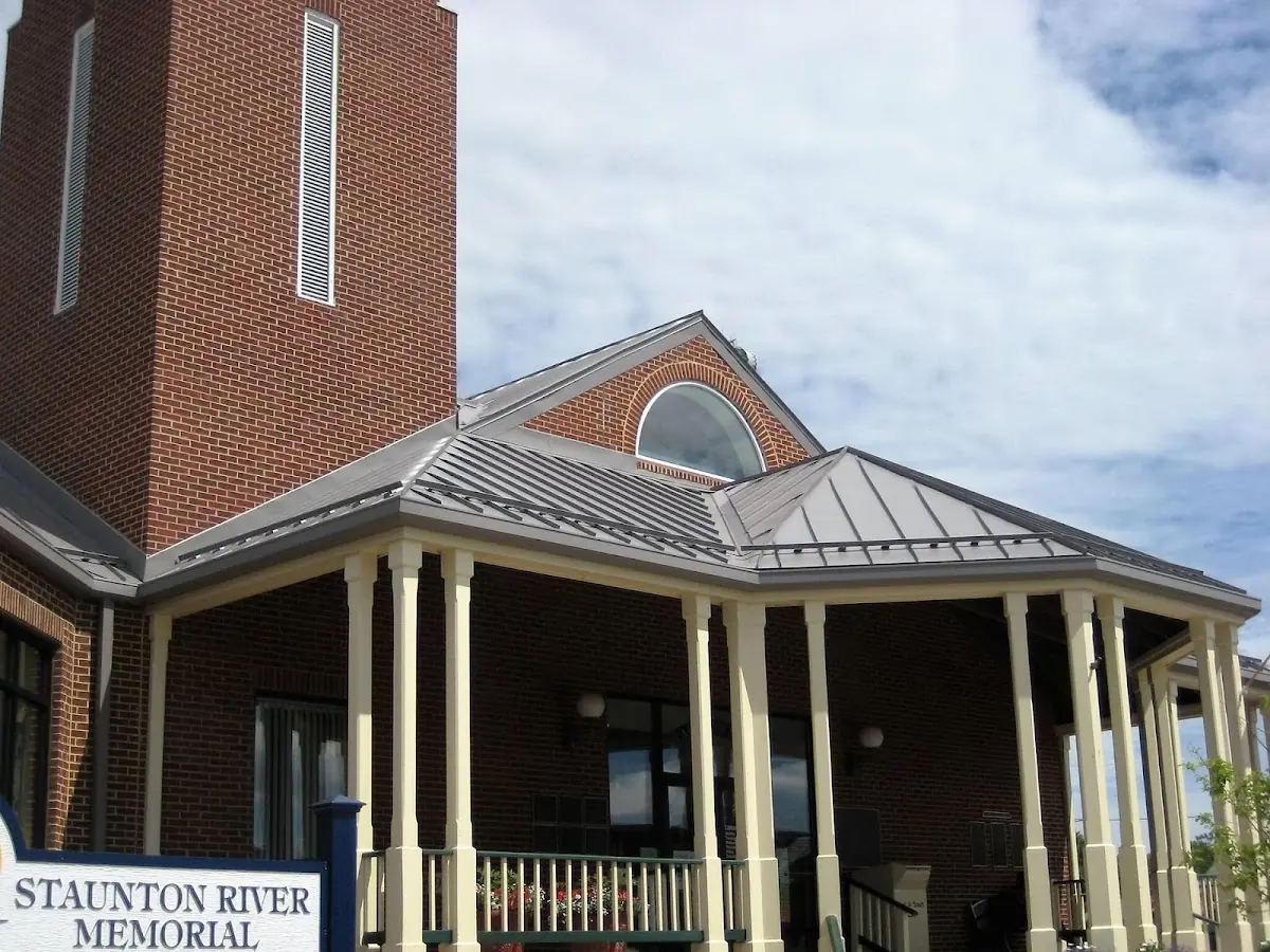 Skilled roofing craftsmen working on a residential roof in South Union